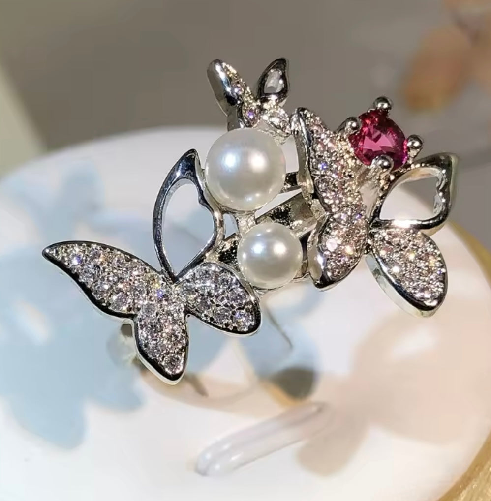 Triple butterfly ring