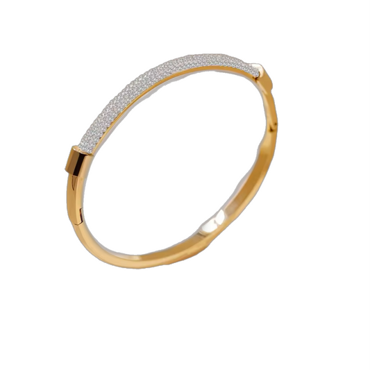 Cuff gold bangle with stones