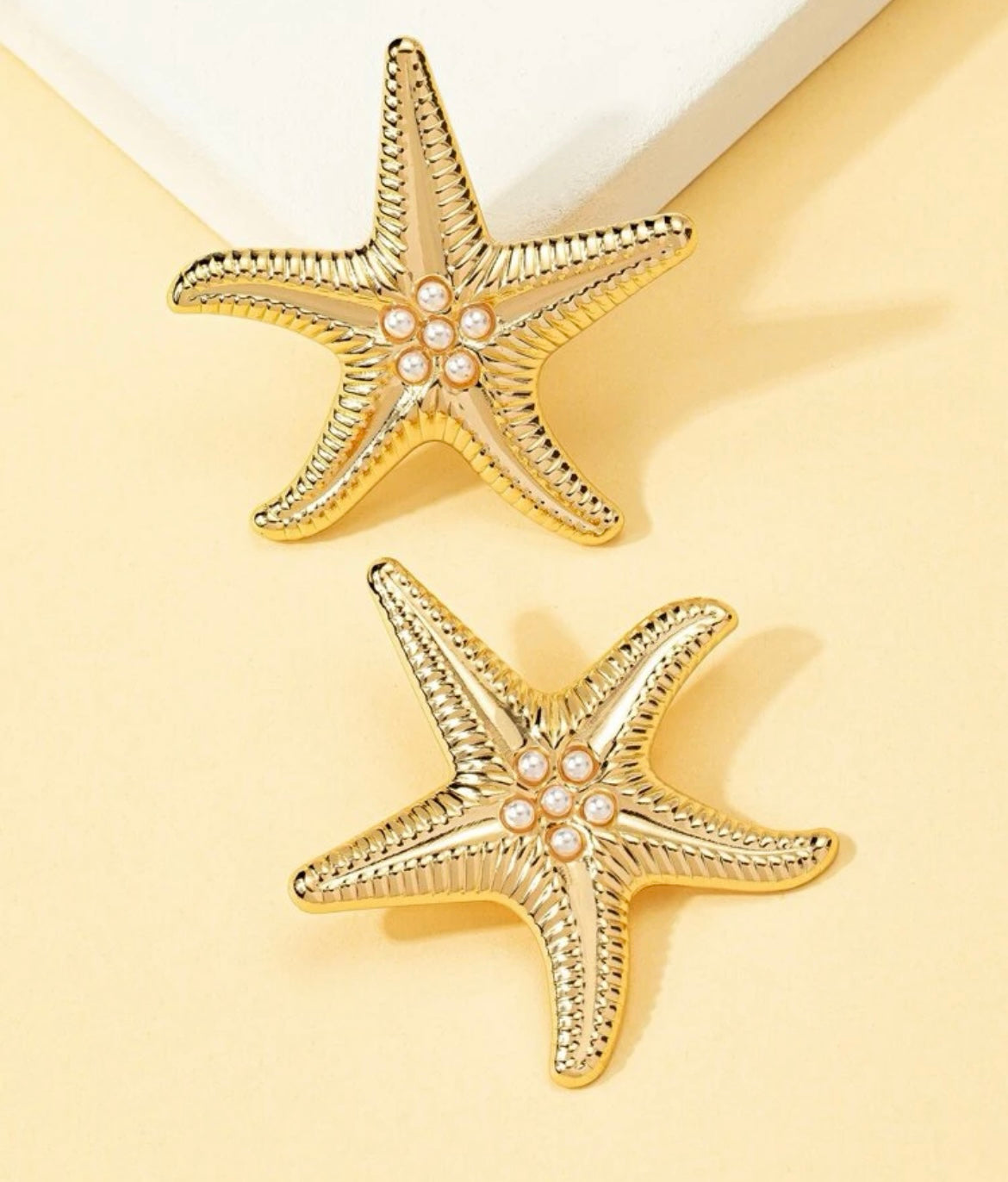 Golden starfish earrings