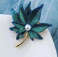 Green leaves brooch