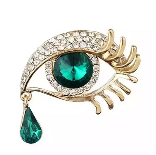 Green eye tear brooch