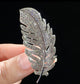 Feather brooch