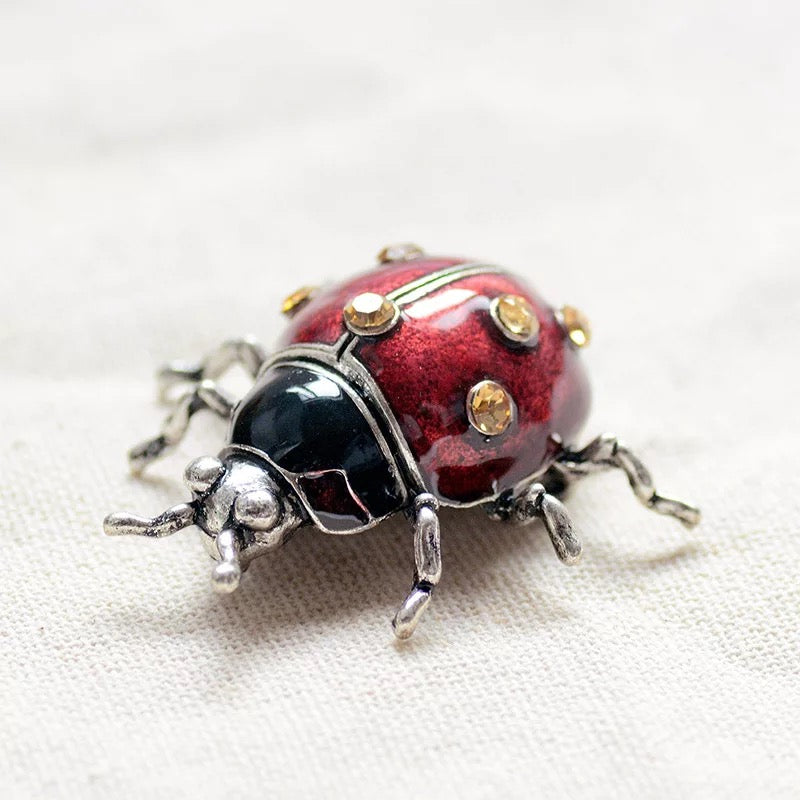 Lady bug brooch