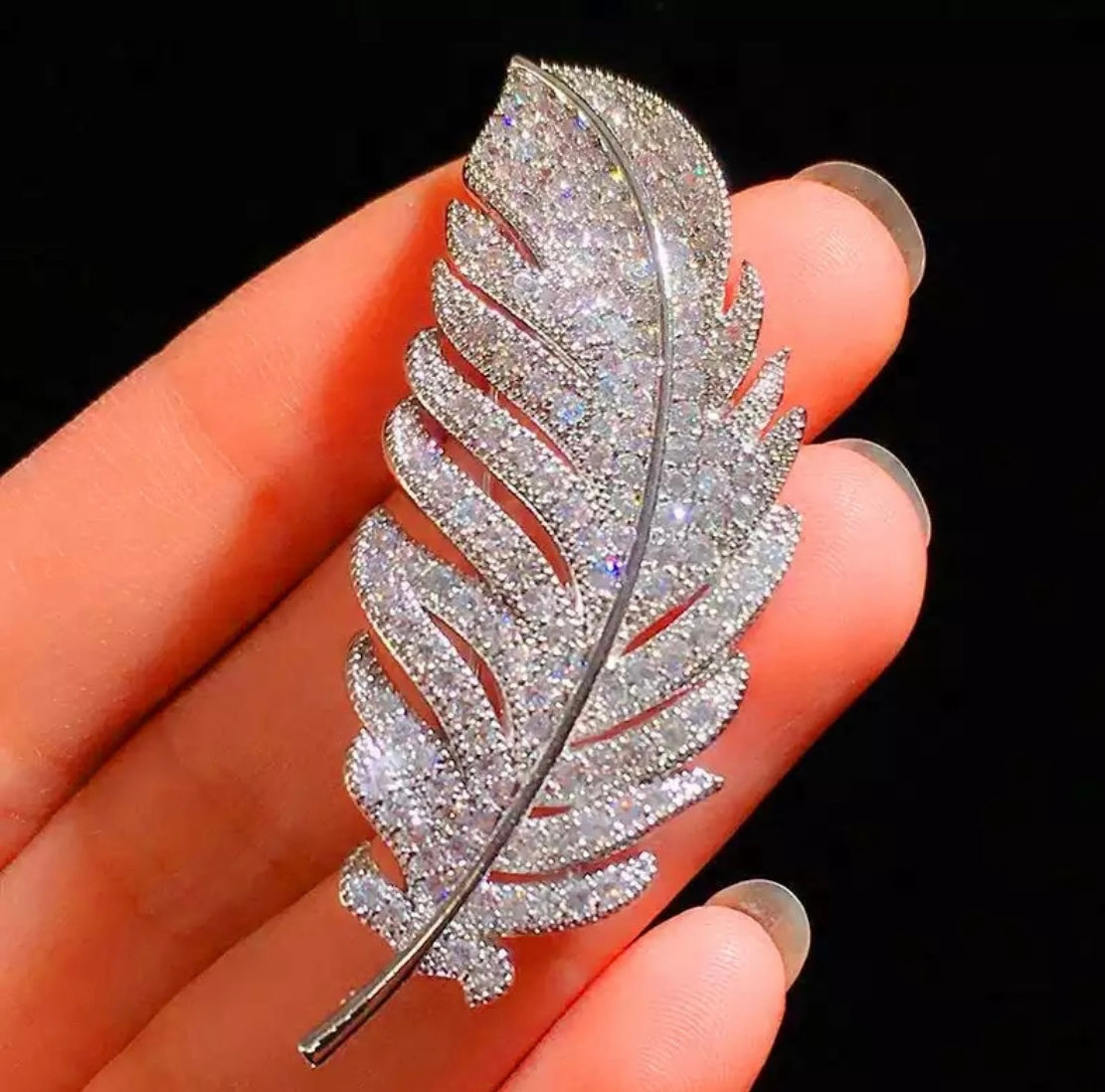 Feather brooch