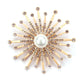 Golden sun brooch