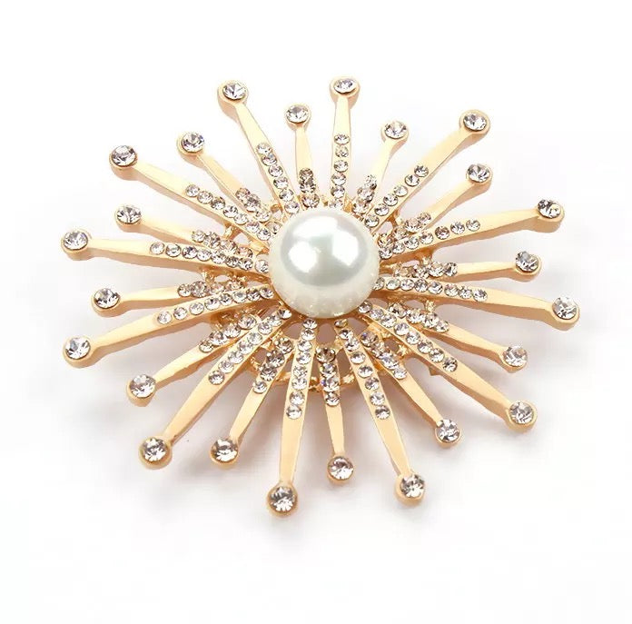 Golden sun brooch