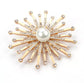 Golden sun brooch