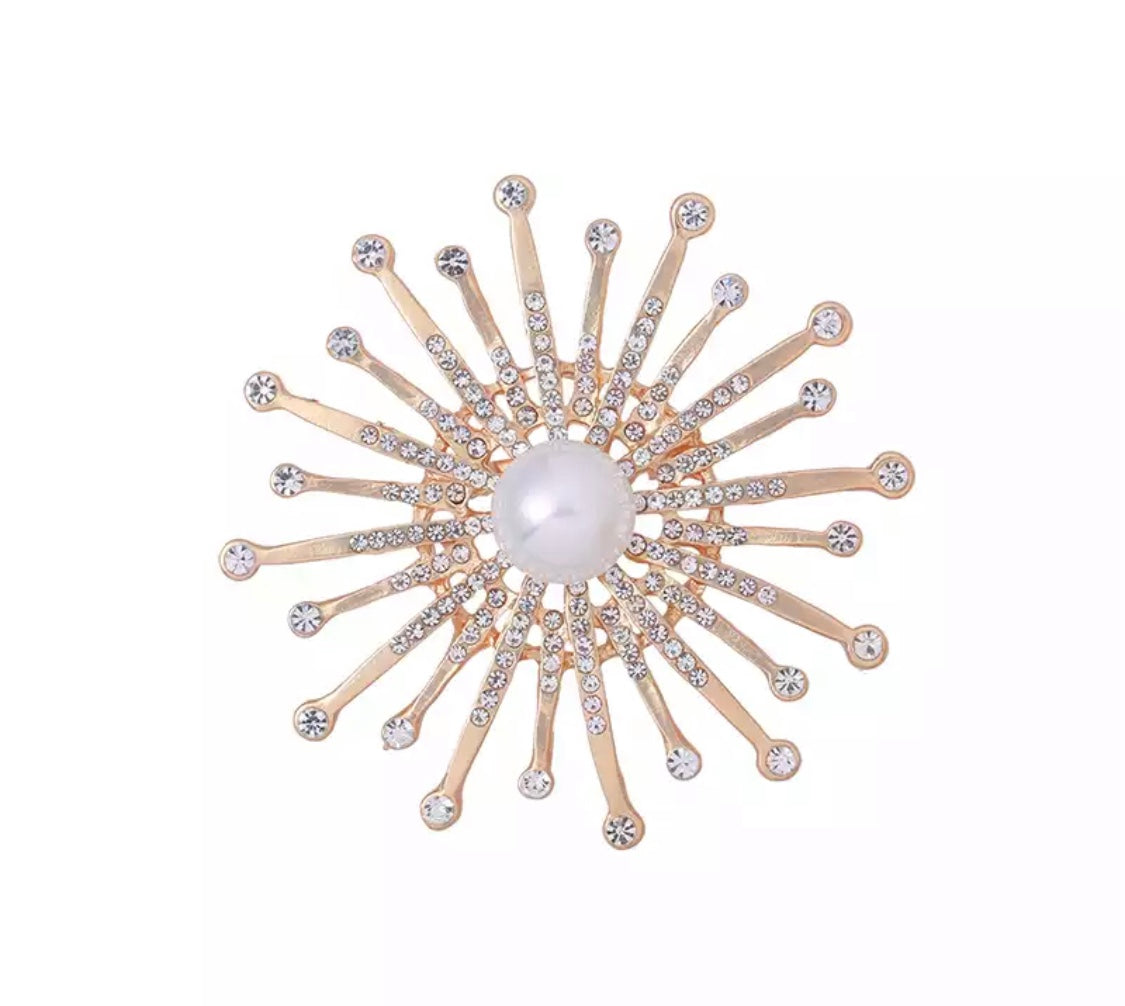 Golden sun brooch