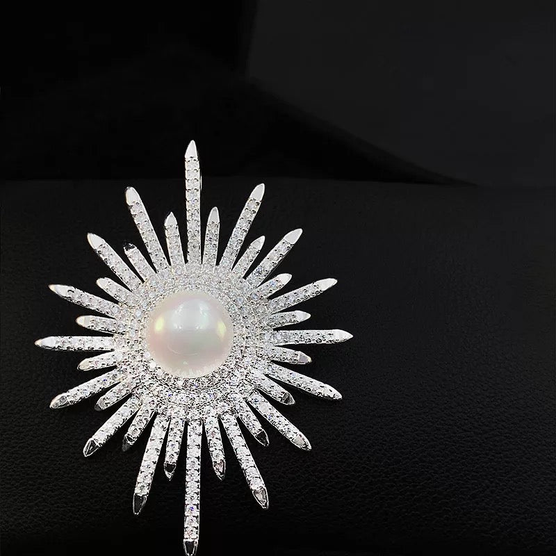 Crystal sun brooch